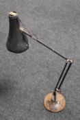 A vintage metal angle poised lamp