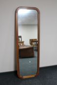 A teak framed rectangular mirror