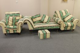 An antique style chaise longue with footstool and scatter cushions plus a pair of matching