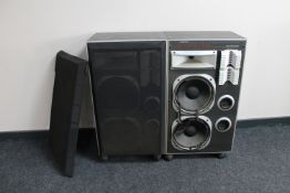 A pair of 20th century Jamo Dynamic D6E floor speakers on castors