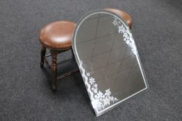 Two leather upholstered pub style stools and a unframed mirror