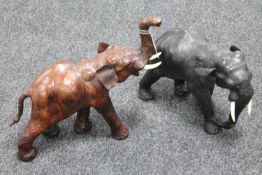 Two leather elephant figures