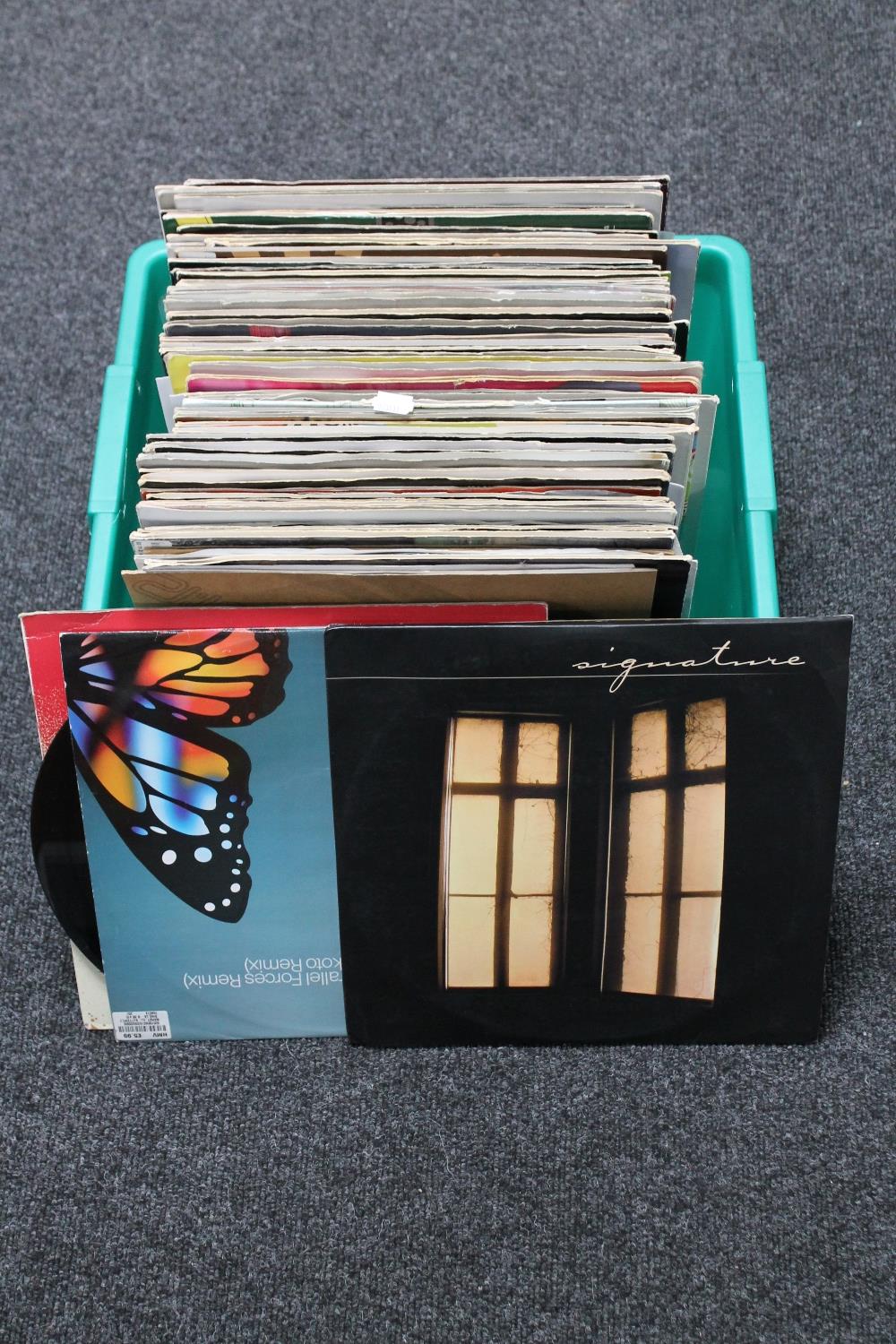 A box of vinyl LP records,