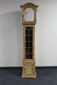 A continental light oak longcase clock case