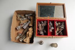 A box and a casket of assorted chess pieces