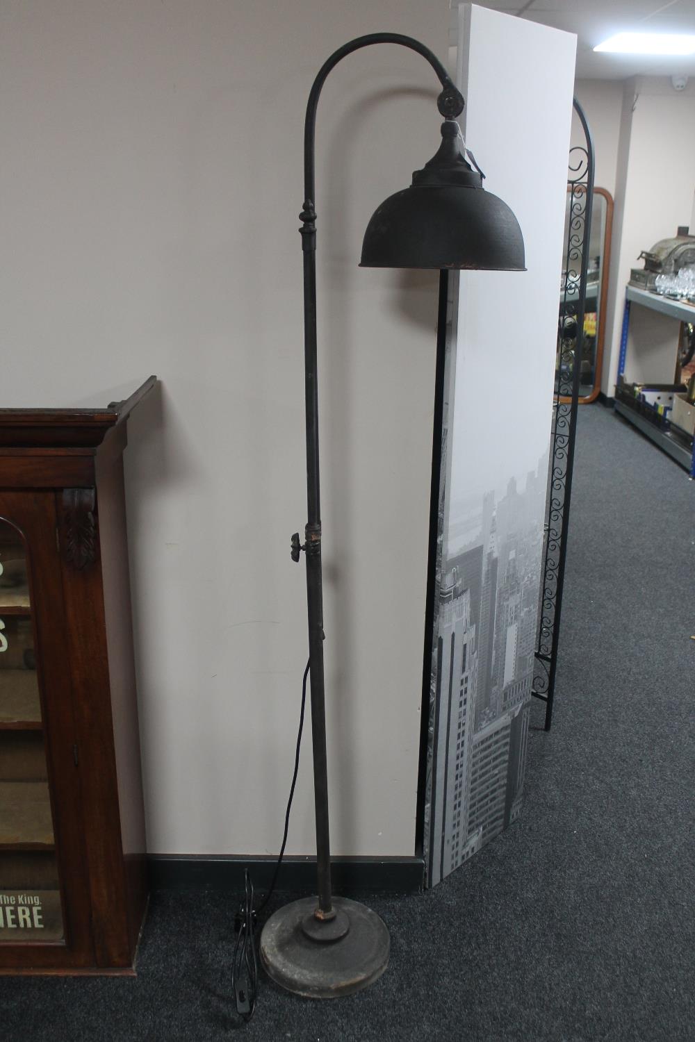 An early 20th century industrial gas lamp with converted fitting