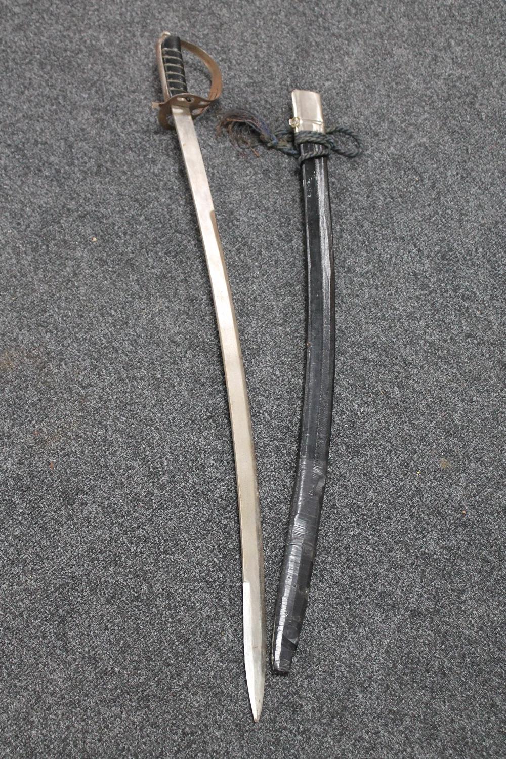 An Indian sword in scabbard