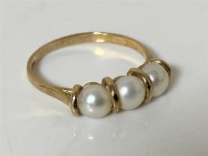 A 9ct gold pearl ring, size N CONDITION REPORT: 2.