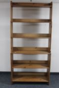 A set of Ikea pine bookshelves