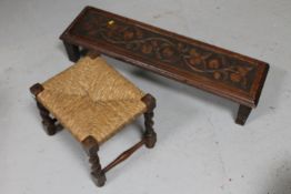 An antique oak rush seated barley twist stool together with a Victorian carved panel