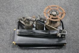A tray of cased servers, camera tripod, two vintage lamps,