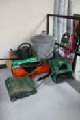 A garden incinerator together with a Qualcast electric lawn mower, dustbin, boxed pressure washer,