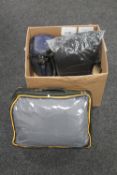 A box of car cover, mini cleaning kit,
