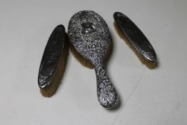 Three silver backed dressing table brushes