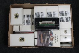 A box of twenty-five boxed Atlas trams with booklets