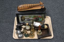 A tray of brass hand bells, crumb scoop and shovel, wooden letter openers,