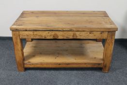 A rustic pine two tier preparation table