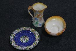 A Maling floral lustre wall plaque together with a Falcon ware Art Deco pottery jug and bowl
