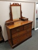 A Victorian walnut mirrored dressing chest,