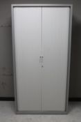 A Triumph metal shutter door office stationary cabinet,