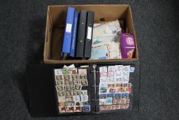 A box of files, albums of stamps,