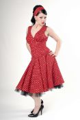 Twenty-five red and black polka dot dresses,