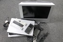 A Sony LCD TV monitor together with three DVD players by Toshiba, Sony, Sky receiver,