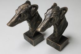 A pair of cast iron greyhound bookends