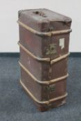An early twentieth century wooden bound travelling trunk