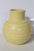 A Wedgwood Keith Murray design bomb vase, matt straw,