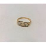A Victorian 18ct gold opal and diamond ring, size S CONDITION REPORT: 3.