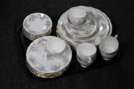 A tray of thirty-six pieces of Colclough tea and dinner china
