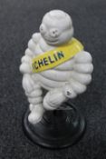 A cast iron figure of Michelin man
