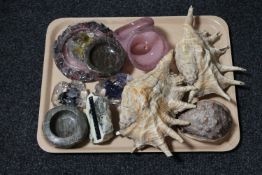 A tray of glass basket, sea shells,
