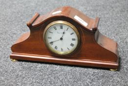 An antique inlaid mahogany Swiss made mantel clock with enamel dial retailed by Mason and Son of