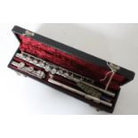 A three piece Embassy chrome flute in fitted box