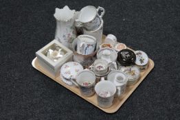 A tray of china trinket and pill boxes, commemorative mugs,