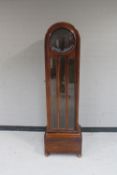 An oak regulator clock case