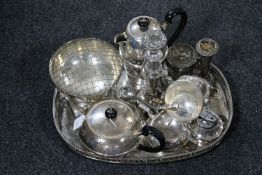 A silver plated gallery tray containing plated wares, four piece tea service,