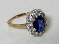 A 9ct gold synthetic sapphire cluster ring, size P1/2 CONDITION REPORT: 3.