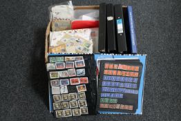 A box of files, albums of stamps,