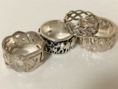 Two silver Celtic knot band rings,