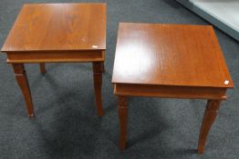 A pair of contemporary lamp tables