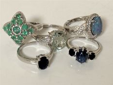 Five silver dress rings set with gemstones
