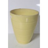 A Wedgwood Keith Murray design conical vase, matt straw, height 13.