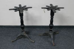 A pair of early twentieth century cast iron table pedestals