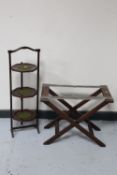 A Victorian mahogany three tier folding cake stand together with an antique mahogany luggage stand