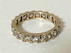 A 9ct gold white sapphire eternity ring, size P1/2 CONDITION REPORT: 3.