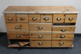 A pine chest of fifteen drawers