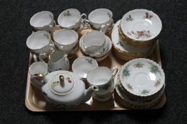 A tray of two part tea services, Royal Stafford and Royal Vale,
